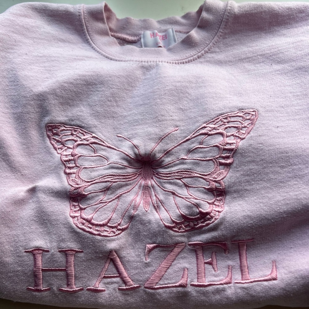 A crewneck from a local boutique by me. Cute, comfy, and great quality.